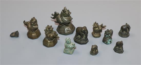 A group of 19th century bronze opium weights